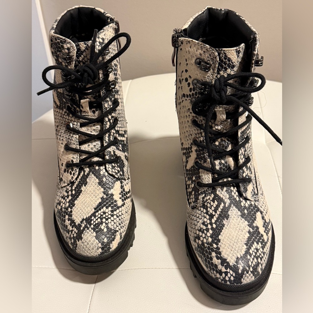 Snake print zip up boots